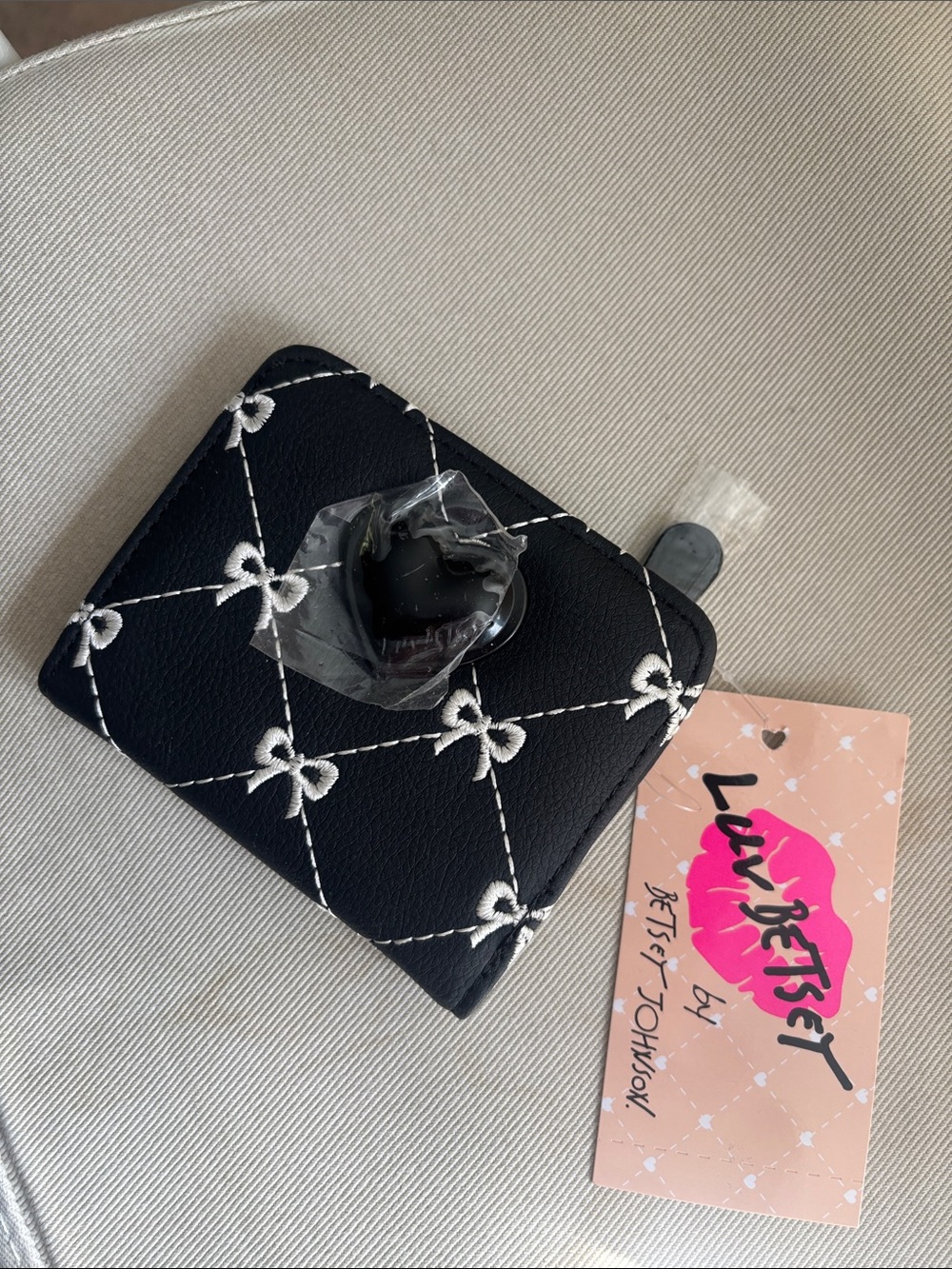 Betsey Johnson Black Quilted Card Wallet with White Bow Stitching